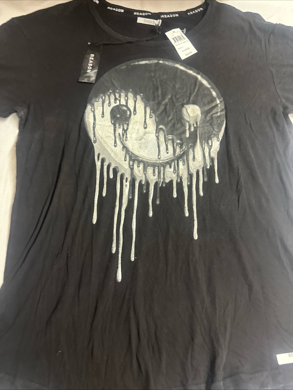 Reason BlackGraphic Women’s Tee with Dripping Smile Design